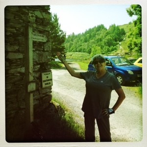 Mary by signpost at Watenlath which was literally the end of the road