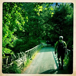 Tony on the bridge heading to the trail 