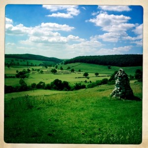 The white cairn and looking back at valley.